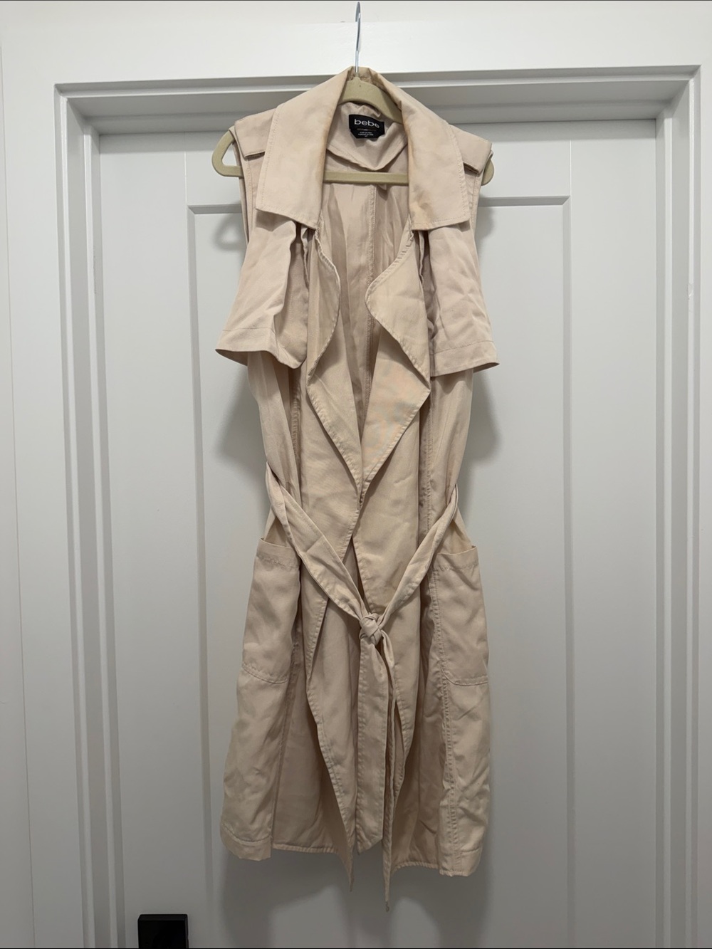 bebe Sleeveless Drape Trench Vest in Cream